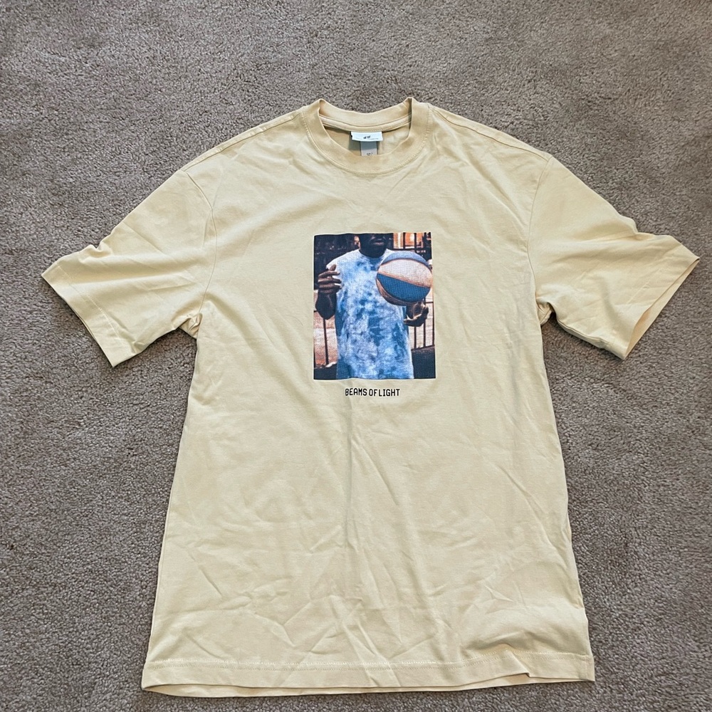 Men’s small T shirt runs big
